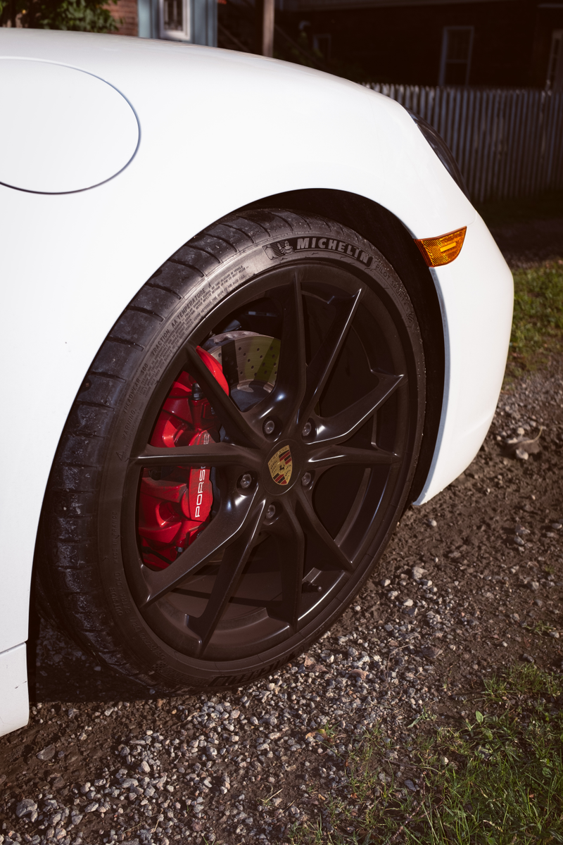 Illustration for article titled Porsche Has A Very Specific Official Way Of Aligning The Crest On Its Wheels